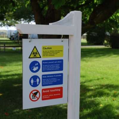 Covid warning signs on Coombe Caravan park